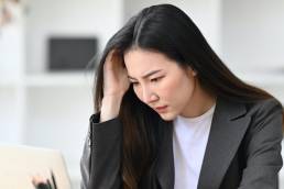 Woman working in office, busy businesswoman