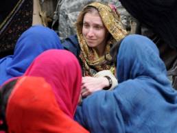 woman volunteering with women abroad featured