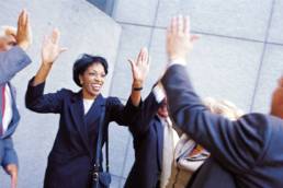 businesswomen-highfive