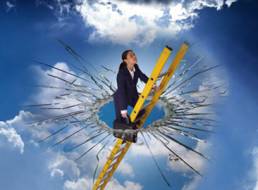 Woman smashing the glass ceiling