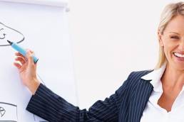 Happy-Young-Business-Woman-At-Work