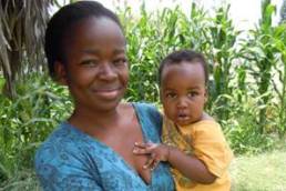 Woman Kind - Photo of a mother and her child