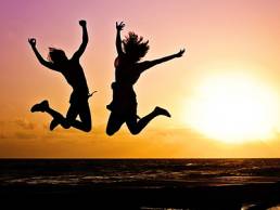Happy women jumping