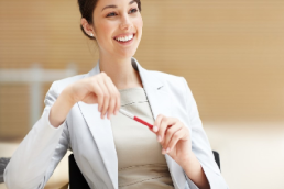 women with pen featured