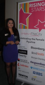 Memona Mohammad with Banner