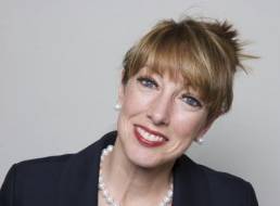 woman in her 50's working in office