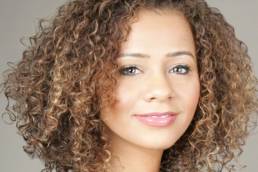 Miranda-Brawn_Headshot_Curly_Black-764x1024 featured