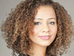 Miranda-Brawn_Headshot_Curly_Black-764x1024 featured