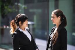 photodune-9405222-two-businesswomen-outdoors-talking-xs