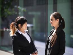 photodune-9405222-two-businesswomen-outdoors-talking-xs