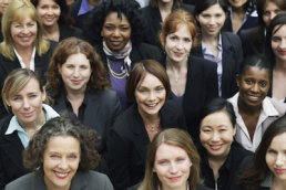 group of diverse women looking at camera featured