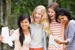 girls collecting exam results featured
