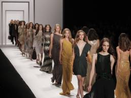 fashion models walking down the catwalk featured