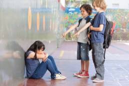 girl-being-bullied-at-school-featured
