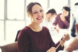 happy-woman-at-work-mental-health-featured