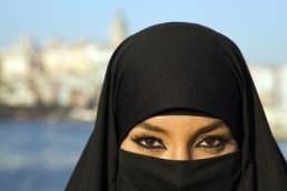 woman wearing a burka featured