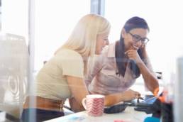 women supporting each other at work featured