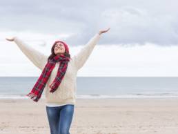 happy-woman-during-winter-winter-blues-featured