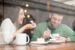 man-and-woman-on-a-date-in-a-coffee-shop-featured