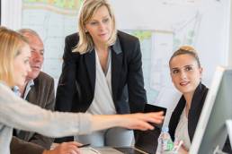 Women owned-business lady telling people what to do/ WeConnect Conference