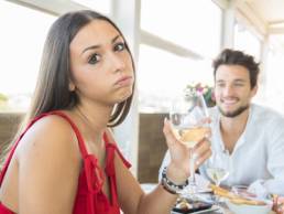 woman-looking-sad-on-a-date-featured