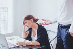 office worker being patronised featured