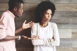 couple arguing about work featured