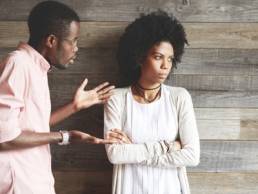 couple arguing about work featured