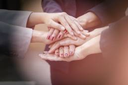 our girls, women's hands featured