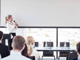 woman public speaking featured