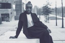 woman in power suit featured