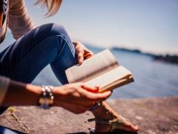 woman reading a book featured