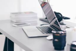 desk with laptop, promoted, promotion featured