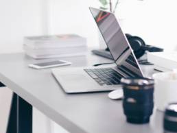 desk with laptop, promoted, promotion featured