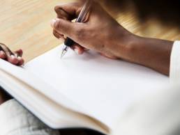 woman writing, dyslexia featured