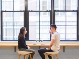 man and woman talking, coffee, communication featured