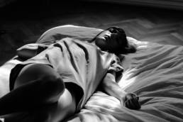 woman lying awake at night featured
