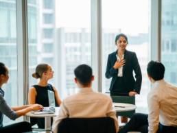 Woman communicating at work featured