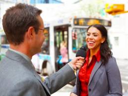 female spokesperson, press interview featured