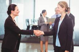 job interview, handshake, two women shaking hands, weakness