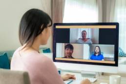 woman remote working on video conference call