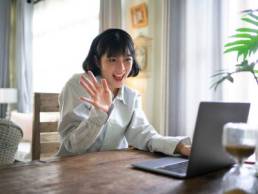 Asian woman on a video call at home, working from home