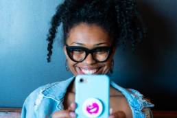 Woman video calling on her mobile phone