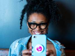 Woman video calling on her mobile phone