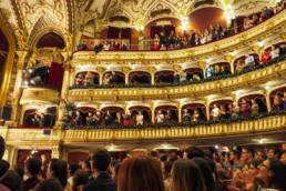 audience applauding at a theatre, female writers