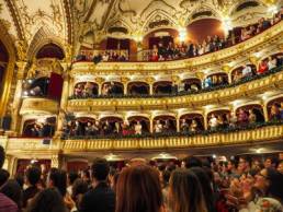 audience applauding at a theatre, female writers