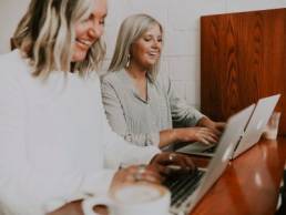 balancing work and relationships, couple working on laptops together