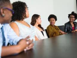 boardroom of diverse people, diversity, black inclusion