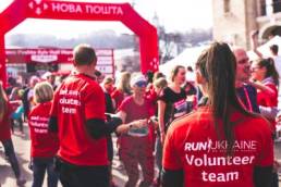 man and woman volunteering, working in the third sector