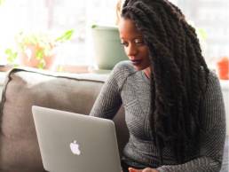 woman studying on her laptop on the sofa, employability 1